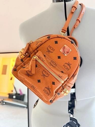 Mcm brown pebbled leather - mcm,